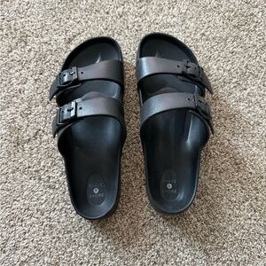 Black off-brand Birkenstocks
